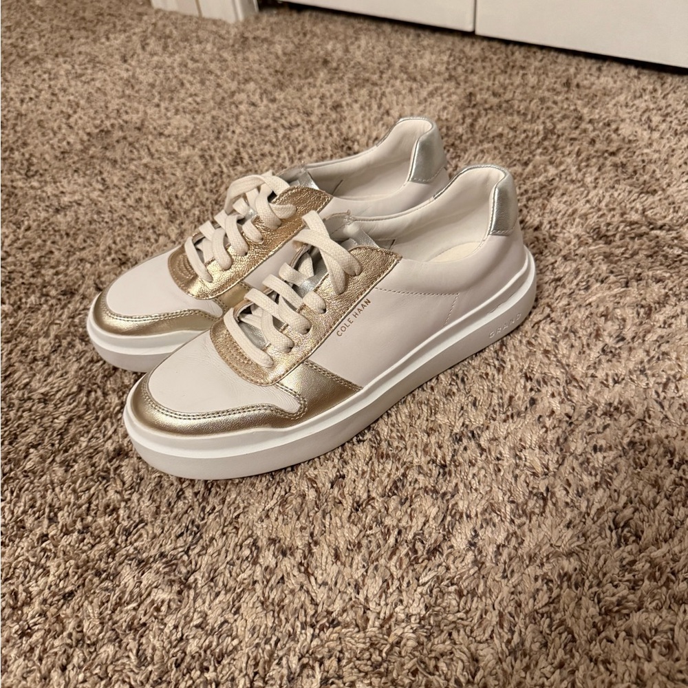 Cole Haan Gold and White Sneakers